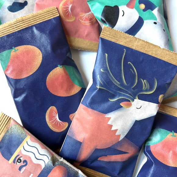 kleine Tüten mit Weihnachtlichen Motiven mit Popcorn Knalle Berlin